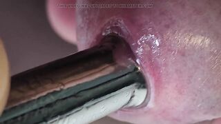 Unleashing utterly cock-squeezing 14mm urethral teardrop buttplug close-up.