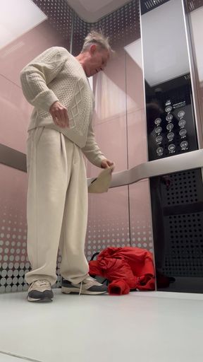 Naked elevator ride in shopping mall