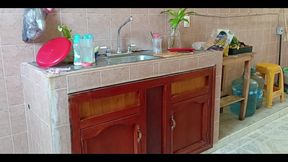 Chubby Stepmother Washes and Cleans the Kitchen