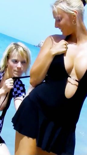 Marion is fucked anal by the camera men on the beach during a lesbian photoshoot