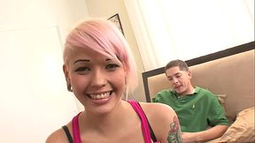 A pink-haired teen makes her porn debut by fucking a guy she'_s never seen before, who fucks her much better than any of her previous boyfriends