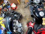 Leather biker milked on his motorcycle