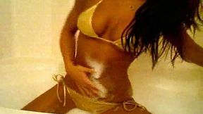 Appetizing ebony webcam babe takes bubble bath showing her rack