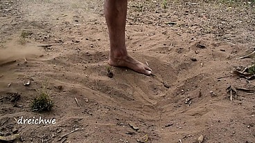 Feet in the hot sand