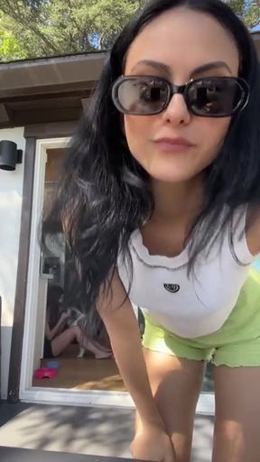 Amateur Camila Mendes shows off her round ass in a revealing pose.