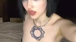 Asian cowgirl mounts hard in leather while squeezing her tits