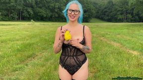 outdoor Blow2Pop topless yellow Q16 manga print with mouthpiece during rain