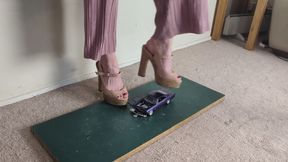 Giantess Lily Kink toy car crush of a 1965 Chevrolet Impala in big chunky heels left view
