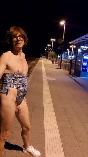 Pissing in action. Transe Carina pees shamelessly and unabashedly at the train station