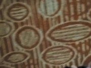 Morning spray on carpet and bed skirt, standing