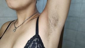 Cleaning and shaving my hairy armpits.