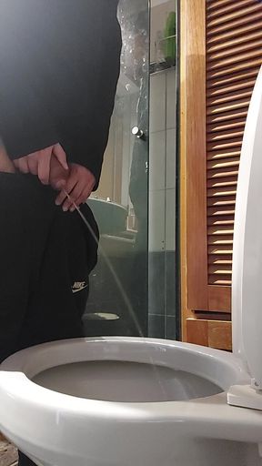 Peeing with a hard cock