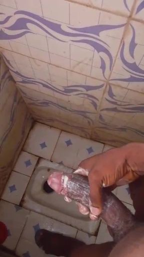 Masturbating Monster Cock in the Bathroom