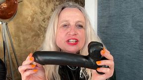 In a latex corset horny prolapse fisting with a mega dildo