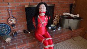 Khrystal and the dice bondage challenge (Red Amoresy bodysuit edition)