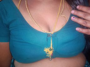 Tamil aunty squeezing her breasts when she is alone and unable to control her emotions.