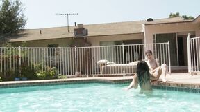 Britanny Lynn and Joanna Angel tease each other in the pool