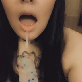 Goth slut bunny giving her cute dildo sloppy head