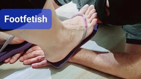 A session of footfetish with spanking and footworship