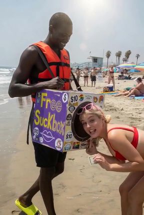 Beach babe takes a sip of cum from her lover's cock on the sandy shore.