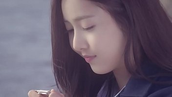Two sexy young Korean girls rough up each other in lesbian action