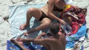beach voyeur. mature couple risky sex on a public beach