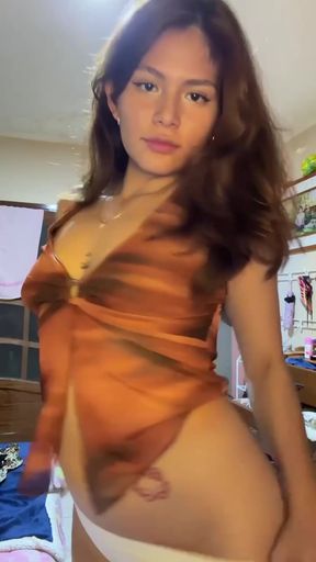 Busty teen flaunts her big ass