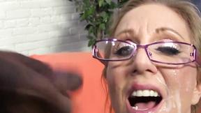 ”Mature Blonde Takes Two Ebony Cocks For Some Hard Ramming”