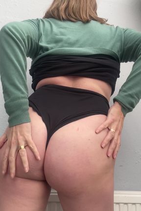 Curvy blonde milf teases in panties before solo playtime