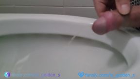 Big morning piss gets gushed on squirming shemale cock