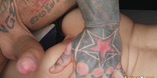 Tattooed stud pounds brunette's bald pussy in hardcore session