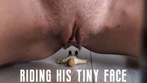 Riding his tiny face