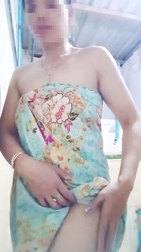 Cute girl appears alone in the bathroom