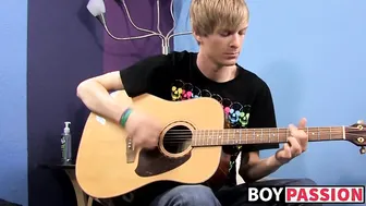 Slim twink plays guitar then jerks his big dick to a cumshot