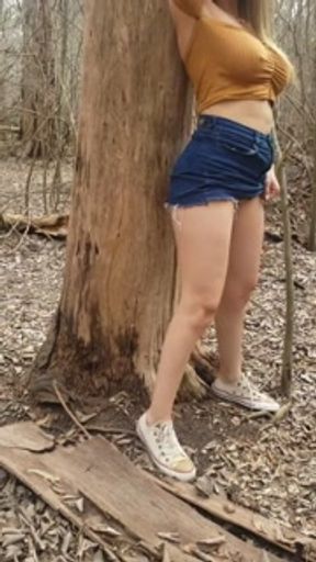 Blonde with big breasts goes into the woods to masturbate