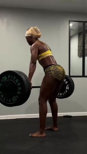 Thick African babe shows off her curvy body while wrestling and dancing