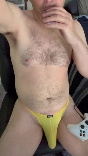 Smoking and thong fun before gay gaming session