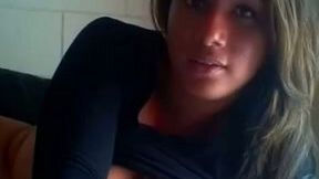 Magnificent tranny babe with big tits and excess tan on webcam