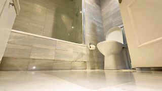 unsuspecting monstrous using the restroom