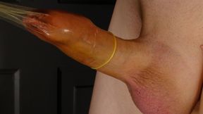 Close up play with erect penis and condom, slaps, tugs, wanks, ties and hits uncut erection
