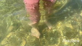 pissing and masturbating underwater at the sea public beach