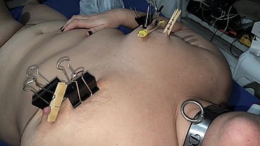 Dorynha playing BDSM with her breasts.