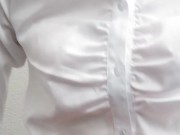 Crossdresser (pink bra is seen through the blouse)