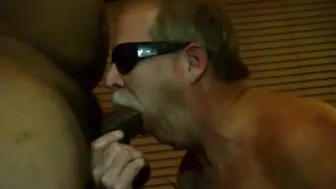 Amateur bear deep throats a big black cock in interracial blowjob