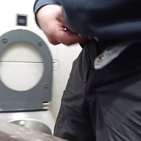 pissing in a public toilet on train