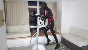 Exercising on a treadmill while wearing high heels and leather restraints.