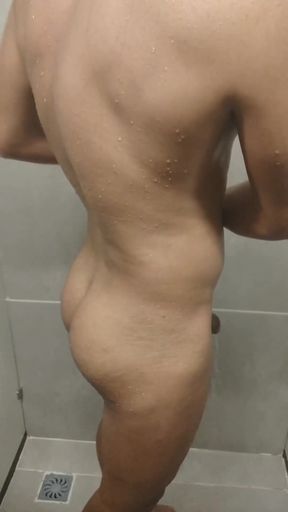 Naked Boy, Well-endowed and with a Big Butt in the Gym Bathroom
