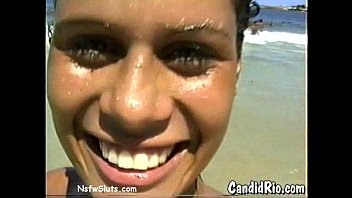 Latina in Bikini Flashes Tits at Beach