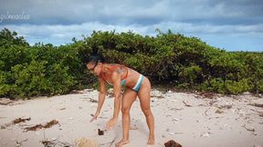 Push ups and chest flex on the beach