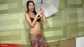 ”Slim tranny is dancing & revealing low hanging balls sack”